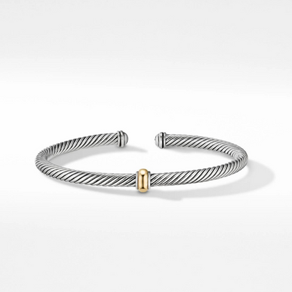 Diamonds are a gals best friend, but this classic David Yurman cable bracelet is a close second. This sterling silver piece is adorned with 18-karot gold, making it an everyday luxury piece she’ll never take off.