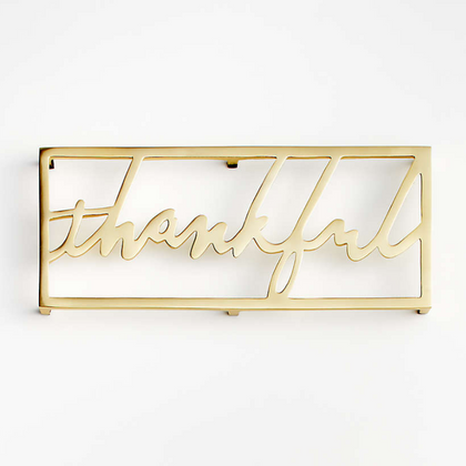 This Thankful Brass Trivet is as useful as it is beautiful. The aluminum trivet is here to hold everything from piping-hot pots of mashed potatoes to fresh-from-the-oven apple pie, all while adding a touch of holiday shine.
