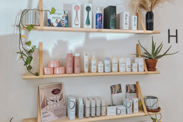 Self Care Retailers, image of 3 shelfs holding an assortment of skincare and beauty products
